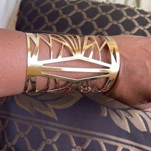 Gold tone cuff bracelet used